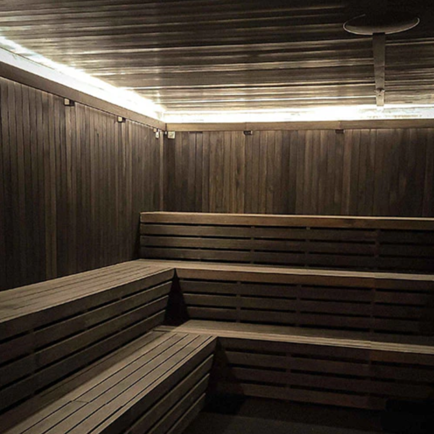 Close-up view of the benches of Scandia Hand Finished Precut Sauna Room in black.