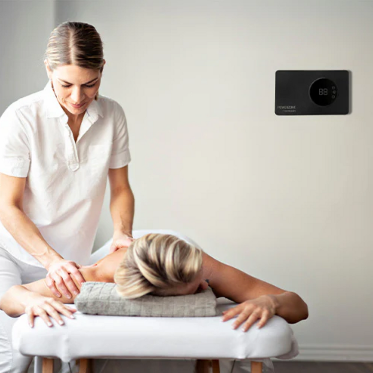 Scandia Powerzone 100 Automatic Ozone Sterilizer ensuring clean air in a professional massage therapy room.