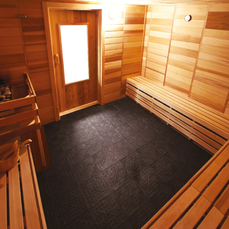 The floor of a sauna covered with Scandia Tru-Tile Flooring units.