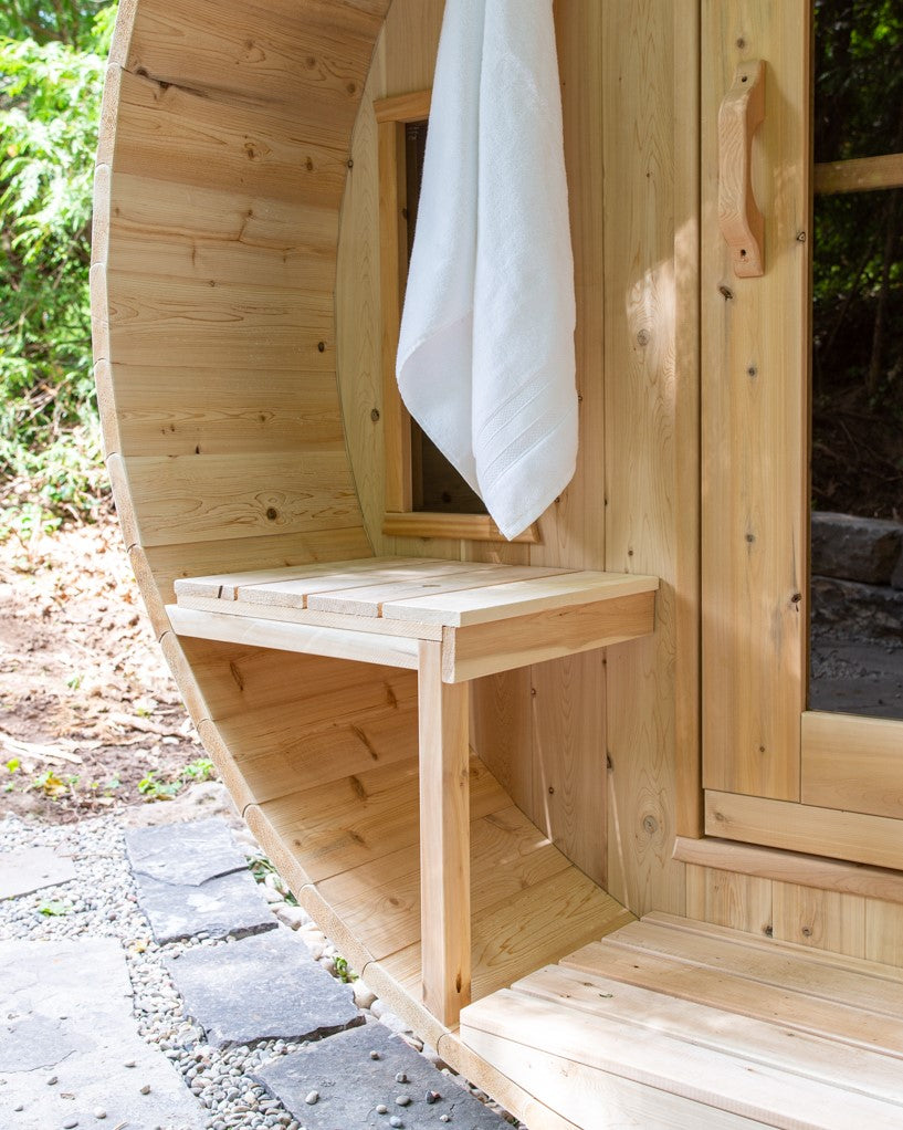 Close-up detailed view of the bench of the canopy porch of Leisurecraft Canadian Timber Tranquility Outdoor Barrel Sauna.