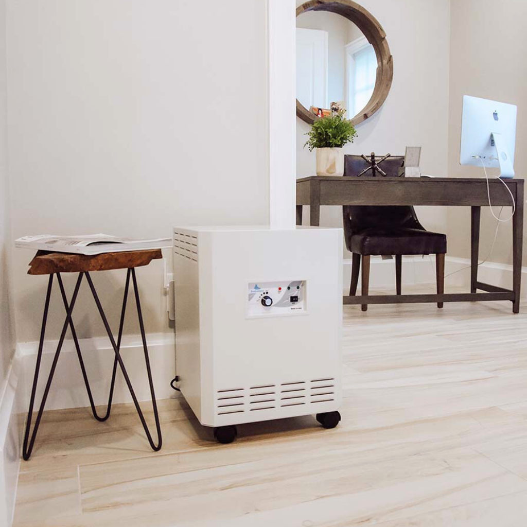 EnviroKlenz Air System Plus air purifier in an office space, complementing the modern interior decor.