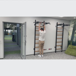 Video of a man exercising with BenchK PB2 Steel Pull-Up Bar black version installed in a gym.