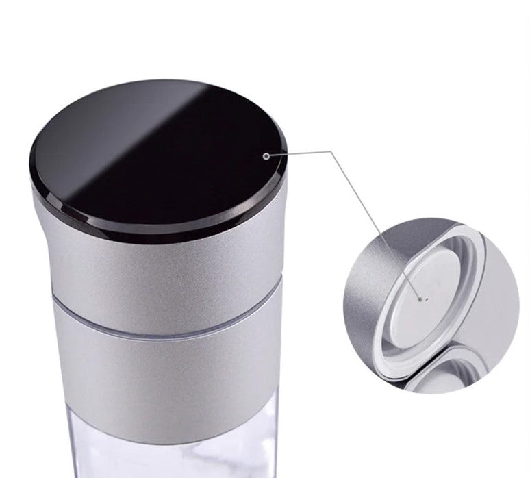 Detailed view of the Prime Biohacking hydrogen water bottle&#39;s sleek silver cap with an integrated carrying loop.