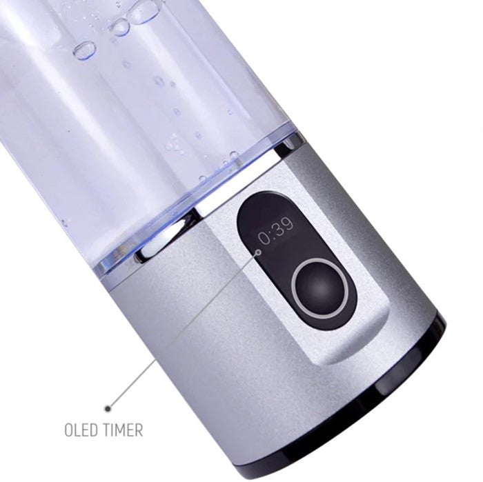 Close-up of Prime Biohacking hydrogen water bottle&#39;s OLED timer in silver, displaying the hydrogen infusion duration.